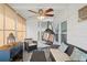 Relaxing sunroom with wicker furniture and ceiling fan at 5079 Lodgewood Dr, Lakeland, FL 33810