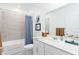 Clean bathroom with tub, shower, and modern vanity at 636 Trotters Dr, Eagle Lake, FL 33839