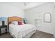 Bright bedroom with queen-size bed and ceiling fan at 636 Trotters Dr, Eagle Lake, FL 33839