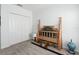 Spacious bedroom with a unique wooden bed frame and large closet at 636 Trotters Dr, Eagle Lake, FL 33839