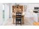 Dining area with wooden table and access to the backyard at 636 Trotters Dr, Eagle Lake, FL 33839