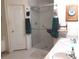 Bathroom featuring a large shower and double vanity at 6759 Ashbury Dr, Lakeland, FL 33809