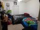 Bright bedroom with two twin beds and ample closet space at 6759 Ashbury Dr, Lakeland, FL 33809