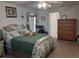 Main bedroom with a queen bed and plenty of closet space at 6759 Ashbury Dr, Lakeland, FL 33809