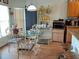 Charming dining area with glass-top table and four ornate chairs at 6759 Ashbury Dr, Lakeland, FL 33809