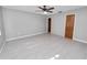 Bright bedroom with tile flooring and ceiling fan at 6929 Farris Dr, Lakeland, FL 33811