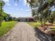 Ranch-style home with a long driveway at 6929 Farris Dr, Lakeland, FL 33811