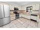 Kitchen boasts stainless steel appliances and ample counter space at 6929 Farris Dr, Lakeland, FL 33811