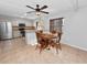 Kitchen features a breakfast bar and stainless steel appliances at 6929 Farris Dr, Lakeland, FL 33811