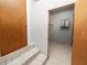 Laundry room with shelving and tile flooring at 6929 Farris Dr, Lakeland, FL 33811