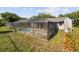Screened-in pool with a large backyard at 6929 Farris Dr, Lakeland, FL 33811