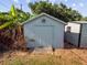 Wooden storage shed with single door at 6929 Farris Dr, Lakeland, FL 33811