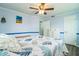 Spacious bedroom with a ceiling fan and ample closet space at 726 Erie Ct, Lakeland, FL 33803