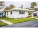 View of a single story home with nicely landscaped lawn at 726 Erie Ct, Lakeland, FL 33803