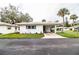 Front view of a single story home with carport at 726 Erie Ct, Lakeland, FL 33803