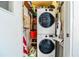 Convenient laundry closet with stackable washer and dryer at 726 Erie Ct, Lakeland, FL 33803