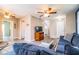 Spacious living room with multiple ceiling fans and a neutral color scheme at 726 Erie Ct, Lakeland, FL 33803