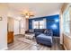 Bright living room with sectional sofa and access to other rooms at 726 Erie Ct, Lakeland, FL 33803