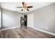 Bedroom with double bed, dresser and ceiling fan at 8309 Porch Ct, Lakeland, FL 33810