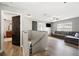 Upstairs loft area with L-shaped sofa and access to bedrooms at 8309 Porch Ct, Lakeland, FL 33810