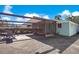 Backyard patio with covered seating area at 1133 N Brunnell Pkwy, Lakeland, FL 33805