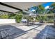 Backyard with covered patio and basketball hoop at 1133 N Brunnell Pkwy, Lakeland, FL 33805