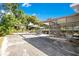 Backyard with patio, covered seating, and basketball hoop at 1133 N Brunnell Pkwy, Lakeland, FL 33805