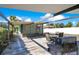 Backyard patio with covered seating and grill at 1133 N Brunnell Pkwy, Lakeland, FL 33805