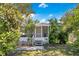 Cute bungalow with a screened porch and mature trees at 1133 N Brunnell Pkwy, Lakeland, FL 33805