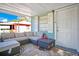 Cozy screened-in porch with sectional sofa at 1133 N Brunnell Pkwy, Lakeland, FL 33805