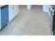 Kitchen with light colored cabinets and floor at 1505 Leamington Ln, Winter Haven, FL 33884
