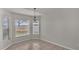 Bright breakfast nook with tile floor and view from large window at 1570 Doves View Cir, Auburndale, FL 33823