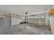 Spacious garage with overhead door and ample storage at 1570 Doves View Cir, Auburndale, FL 33823