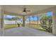 Spacious screened porch overlooking backyard at 1570 Doves View Cir, Auburndale, FL 33823