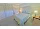 Bedroom with double bed, nightstand, and ample closet space at 1600 W Lake Parker Dr # B7, Lakeland, FL 33805