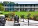 Modern building exterior with grill and landscaped grounds at 1600 W Lake Parker Dr # B7, Lakeland, FL 33805