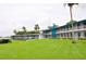 Two-story building with balconies overlooking a lawn at 1600 W Lake Parker Dr # B7, Lakeland, FL 33805