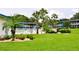 Inviting community pool with lush landscaping at 1600 W Lake Parker Dr # B7, Lakeland, FL 33805