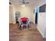 Dining area with four-chair table and adjacent kitchen at 1600 W Lake Parker Dr # B7, Lakeland, FL 33805