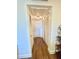 Hallway with light flooring, doors to bedrooms and closets at 1600 W Lake Parker Dr # B7, Lakeland, FL 33805