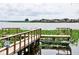 Private dock on a tranquil lake with lush vegetation at 1600 W Lake Parker Dr # B7, Lakeland, FL 33805
