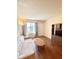 Living room with light flooring, sofa, coffee table, and window at 1600 W Lake Parker Dr # B7, Lakeland, FL 33805