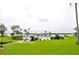 Scenic view of a lake or waterfront from a community green space at 1600 W Lake Parker Dr # B7, Lakeland, FL 33805