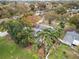 Aerial view showcasing the house's backyard oasis with a screened enclosure at 1628 Lakewood S Dr, Lakeland, FL 33813