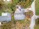 Overhead view of house, showing backyard, garden, and pool at 1628 Lakewood S Dr, Lakeland, FL 33813