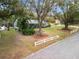 Single-story house with a large backyard and mature trees at 1628 Lakewood S Dr, Lakeland, FL 33813