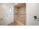 Bathroom with shower/tub combo and built-in grab bars at 1628 Lakewood S Dr, Lakeland, FL 33813