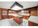 Spacious kitchen with an island and wood cabinets at 1628 Lakewood S Dr, Lakeland, FL 33813
