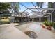Large pool needing renovation with screened enclosure at 1628 Lakewood S Dr, Lakeland, FL 33813
