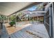 Enclosed pool area with a partially covered deck at 1628 Lakewood S Dr, Lakeland, FL 33813